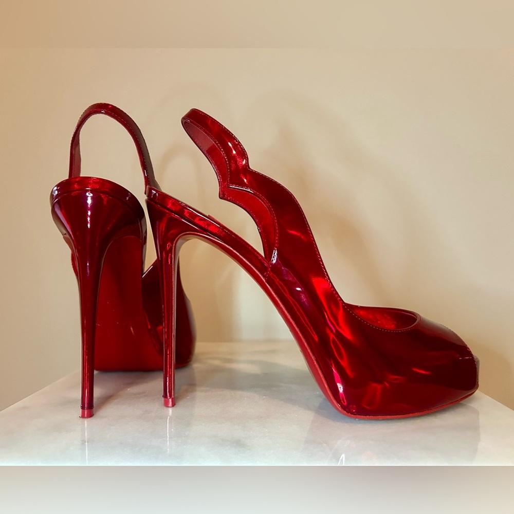 Christian Louboutin
Patent Leather Slingback Pumps